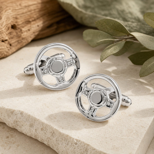 Silver Sports Car Steering Wheel Cufflinks in a themed setting
