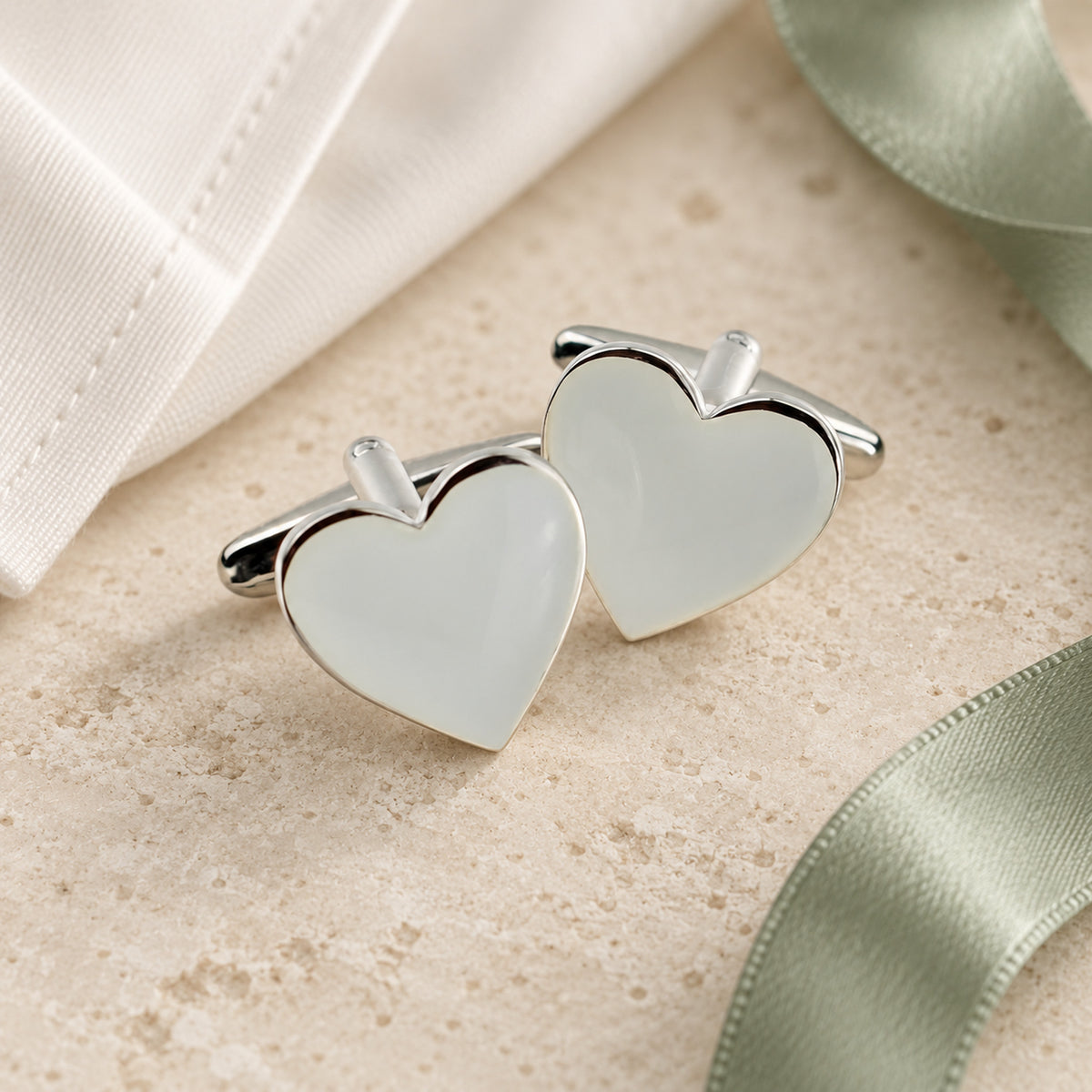 White Love Heart Cufflinks in a muted gift setting