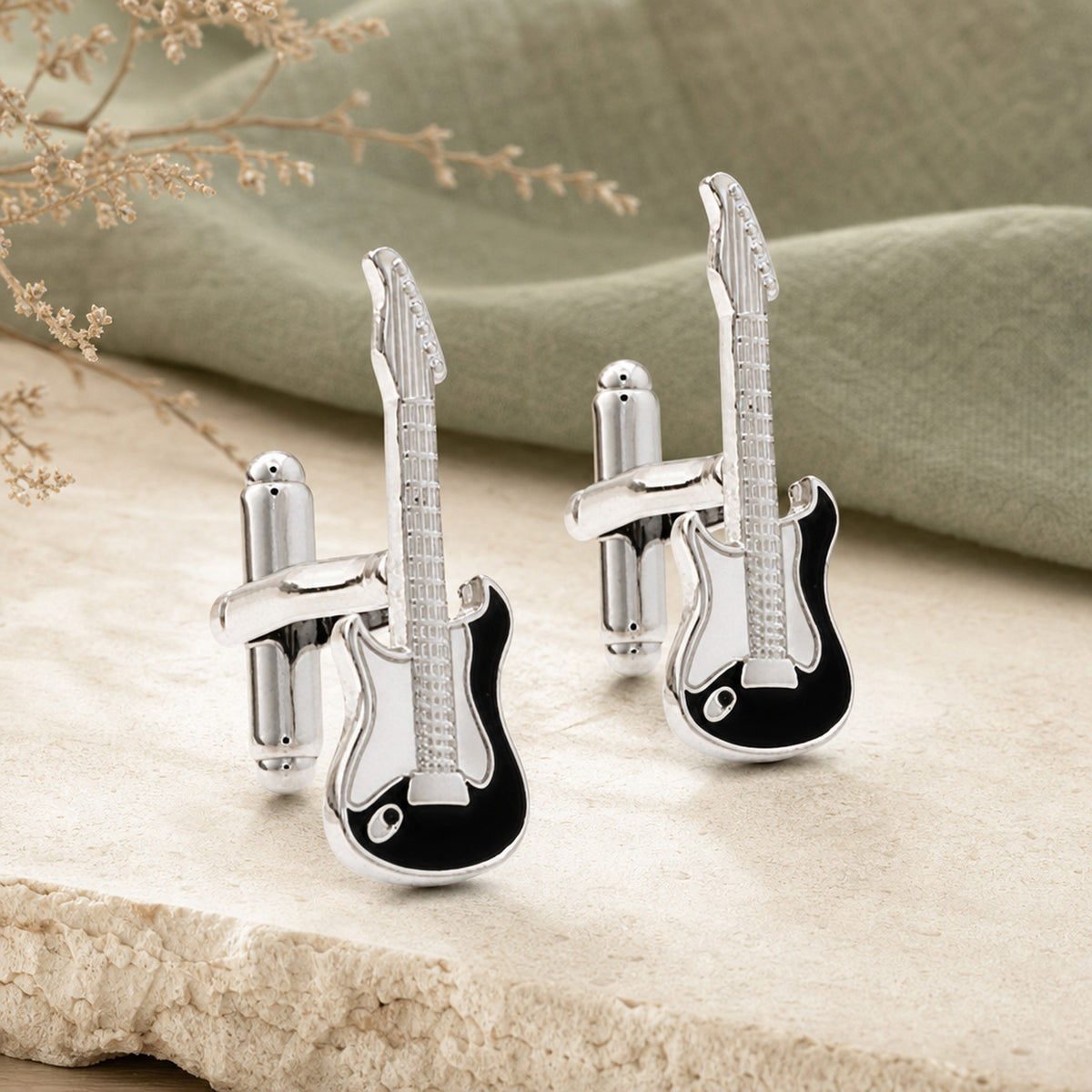Silver And Enamel Electric Guitar Cufflinks in a themed setting