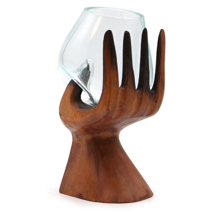 Carved Hand with Molten Glass Bowl on Wood