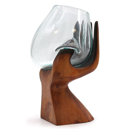 Carved Hand with Molten Glass Bowl on Wood