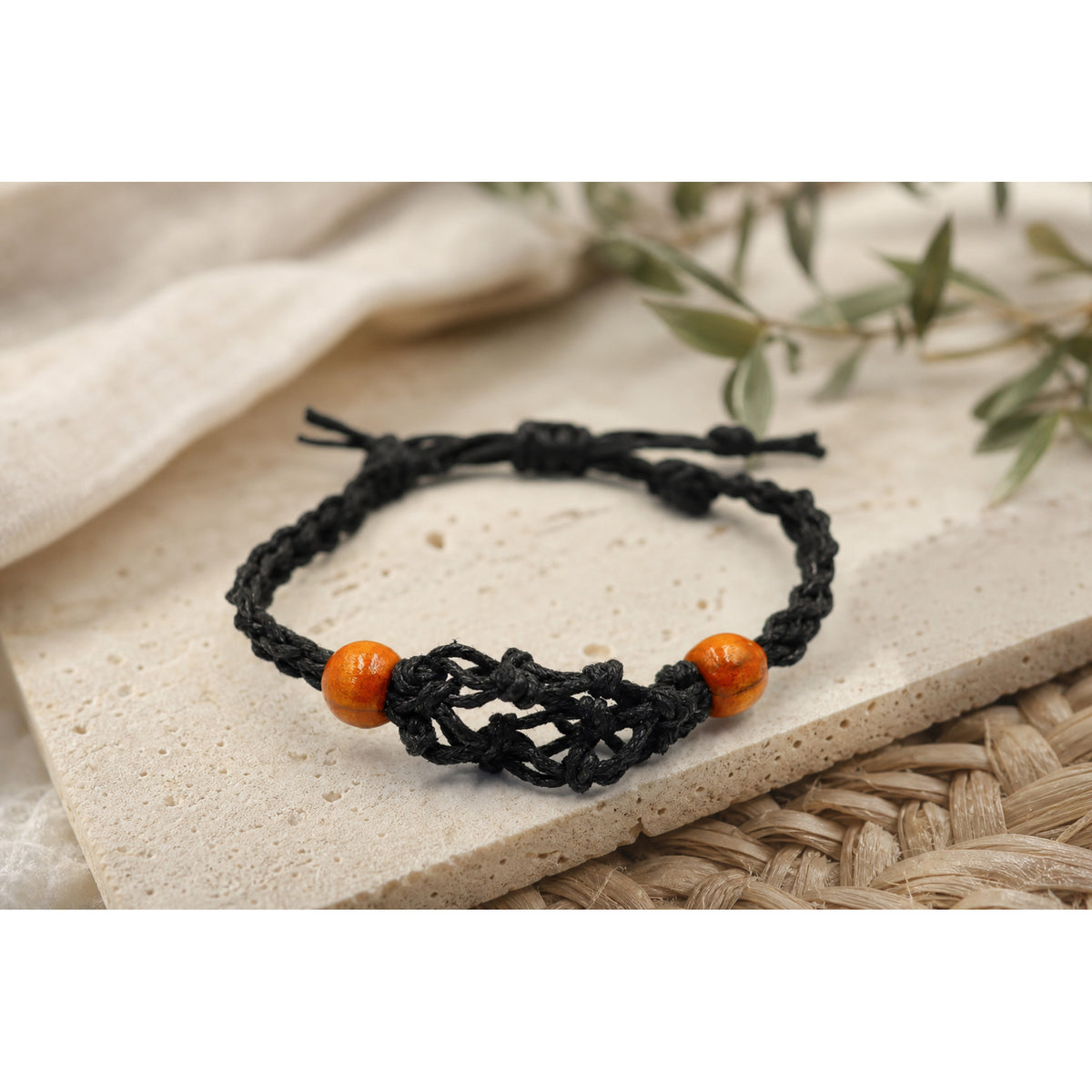 Black Gemstone Adjustable Cord Bracelet in a themed gift-guide setting