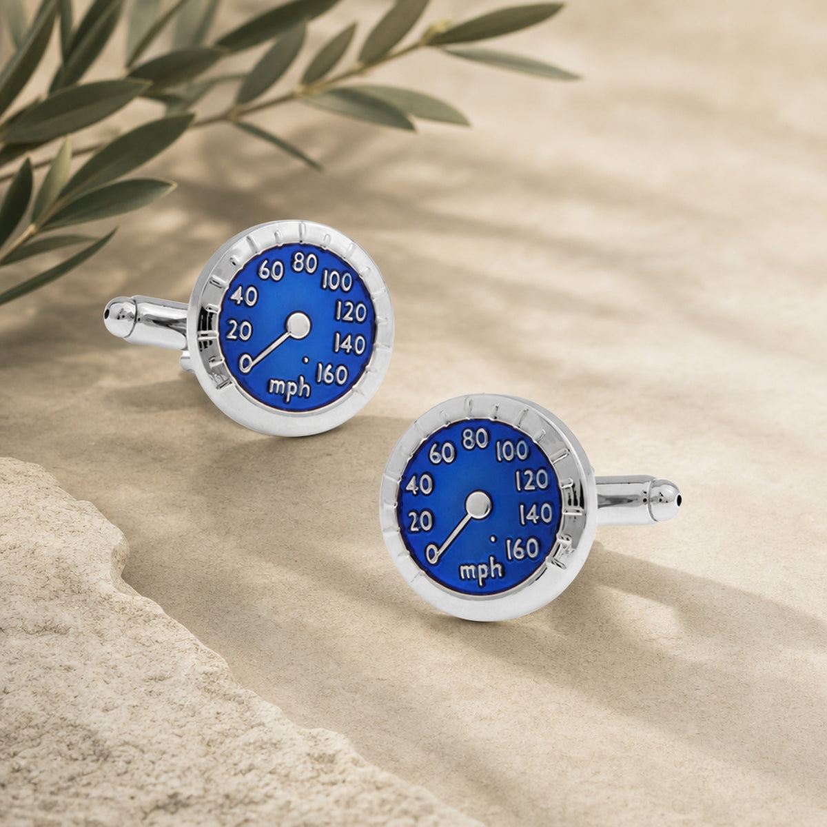 Silver And Blue Speedometer Cufflinks in a themed setting