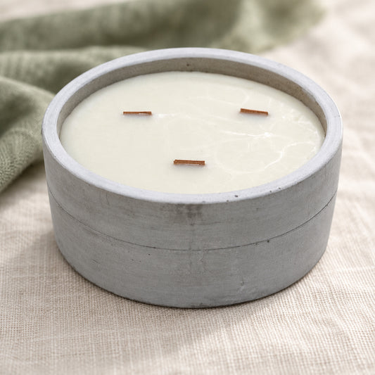 Patchouli Dark Amber Concrete Candle Wick in a muted gift setting